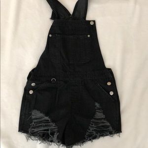 Never worn black ripped overalls
